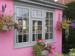 Pink house with grey windows