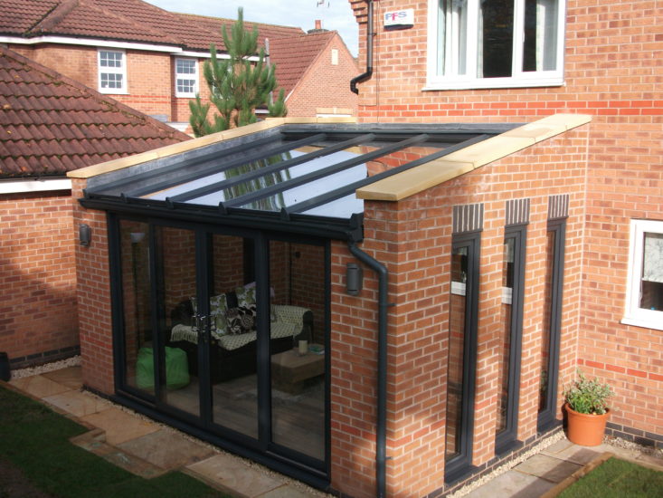 A modern lean to sun room installed by KLG Rutland
