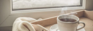 Tea on tray in front of a window