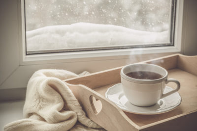 Tea on tray in front of a window