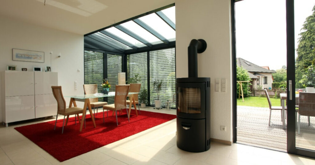 conservatory dining room with log burner