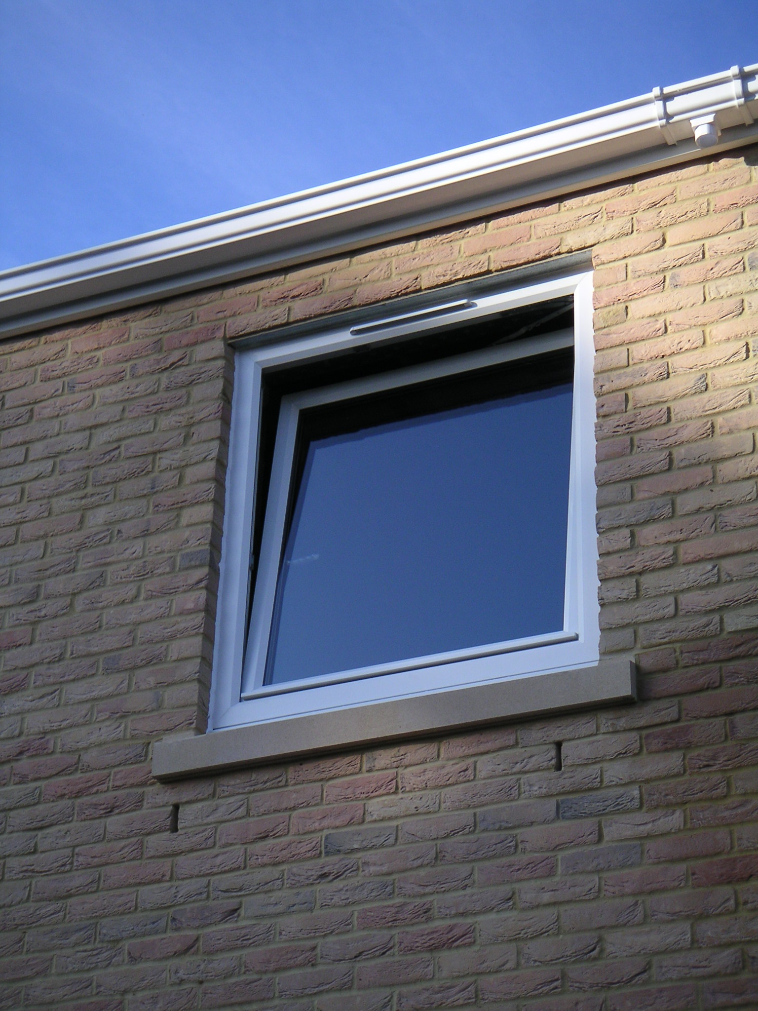 White tilt and turn window seen from outside