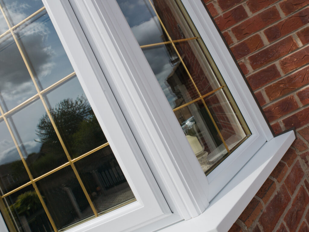 Close up of white bay windows