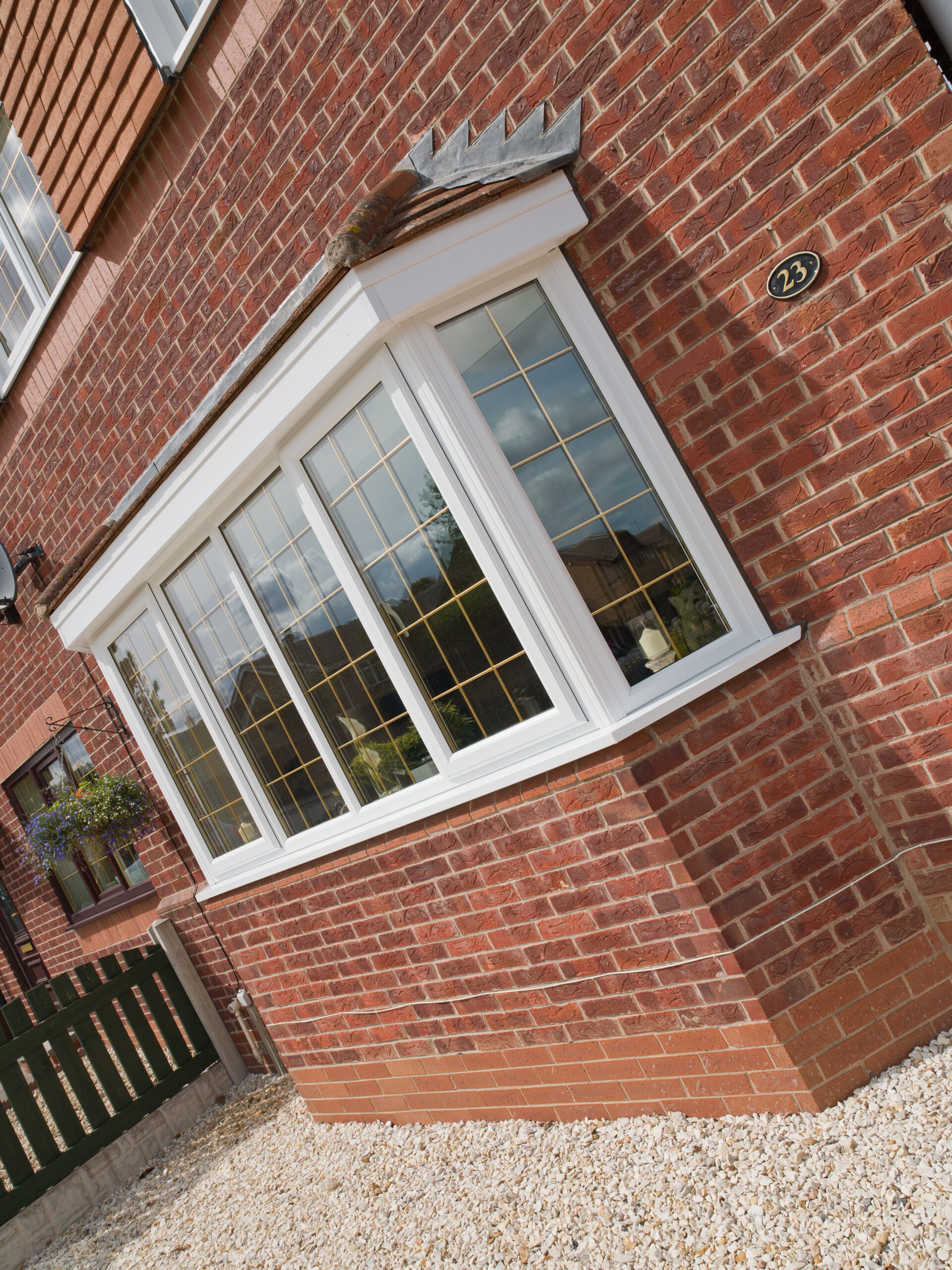 White bay windows on the side of a house
