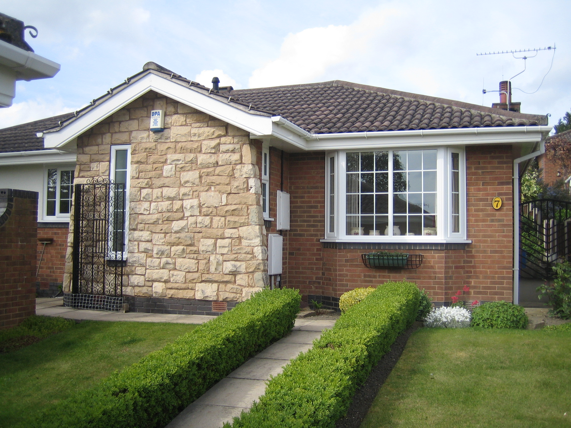 Bay windows on a small bungalow