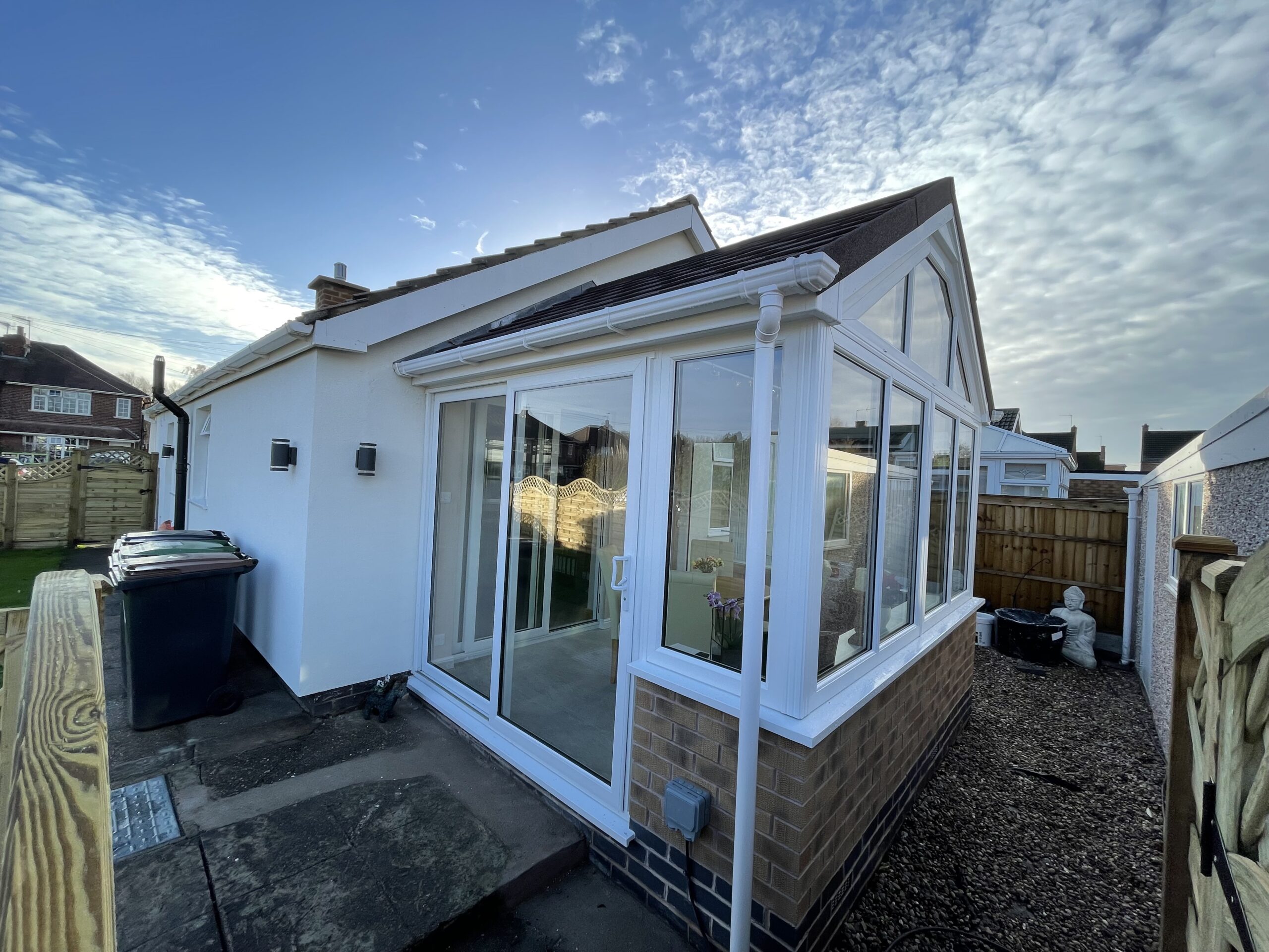 A conservatory with sliding patio doors installed